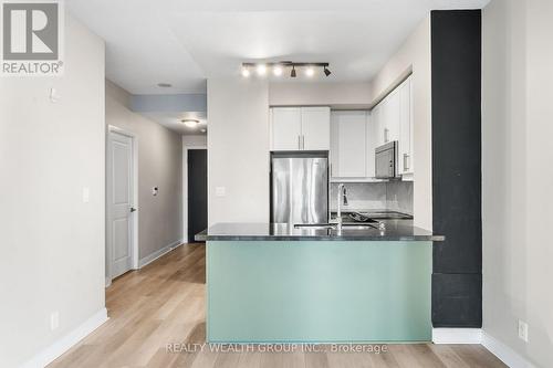 302 - 60 Absolute Avenue, Mississauga, ON - Indoor Photo Showing Kitchen With Stainless Steel Kitchen