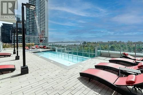 2108 - 33 Shore Breeze Drive, Toronto, ON - Outdoor With In Ground Pool