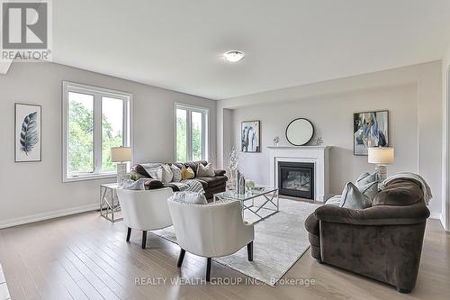 24 - 400 Finch Avenue, Pickering, ON - Indoor Photo Showing Living Room With Fireplace