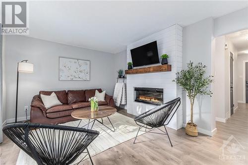 34 Rickey Place, Kanata, ON - Indoor Photo Showing Living Room With Fireplace