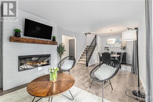 34 Rickey Place, Kanata, ON - Indoor Photo Showing Living Room With Fireplace