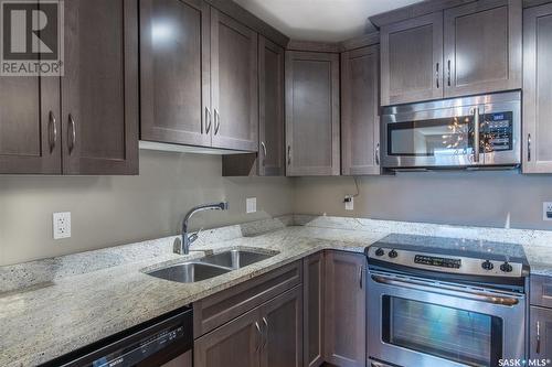 305 115 Willowgrove Crescent, Saskatoon, SK - Indoor Photo Showing Kitchen With Stainless Steel Kitchen With Double Sink With Upgraded Kitchen