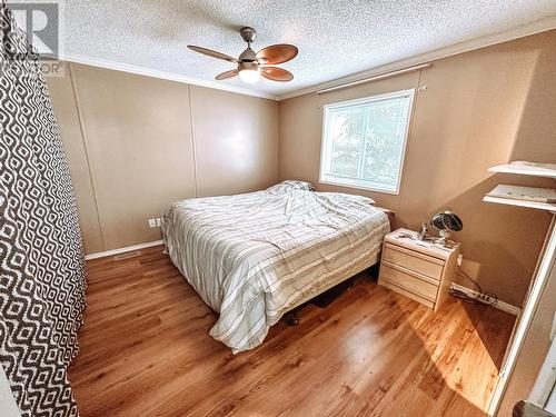 21 208 Eighth Street, 100 Mile House, BC - Indoor Photo Showing Bedroom