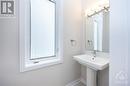 2pc powder room off the foyer - 261 Surface Lane, Ottawa, ON  - Indoor Photo Showing Bathroom 