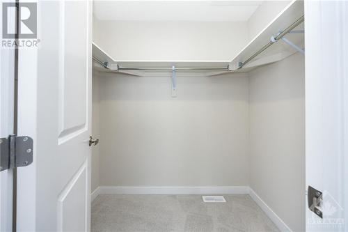 Primary walk-in closet - 261 Surface Lane, Ottawa, ON - Indoor With Storage