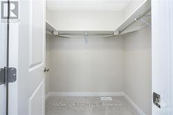 Primary walk-in closet - 