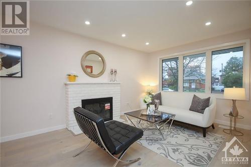 610 Alesther Street Unit#A, Ottawa, ON - Indoor Photo Showing Living Room With Fireplace