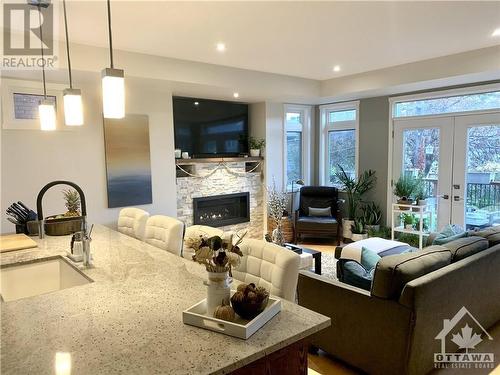 283 Kirchoffer Avenue, Ottawa, ON - Indoor Photo Showing Living Room With Fireplace