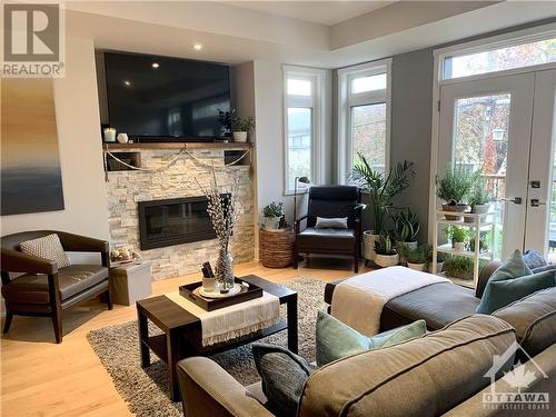 283 Kirchoffer Avenue, Ottawa, ON - Indoor Photo Showing Living Room With Fireplace