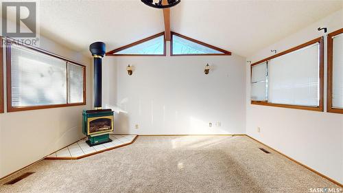 1002 Broad Street N, Regina, SK - Indoor Photo Showing Other Room With Fireplace