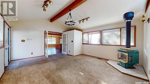 1002 Broad Street N, Regina, SK - Indoor Photo Showing Other Room With Fireplace