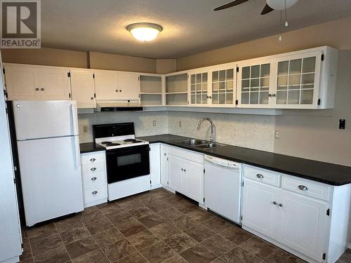 7755 Mclennan Road, Vernon, BC - Indoor Photo Showing Kitchen With Double Sink