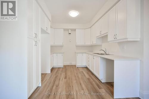 26 - 305 Garner Road W, Hamilton, ON - Indoor Photo Showing Kitchen With Double Sink