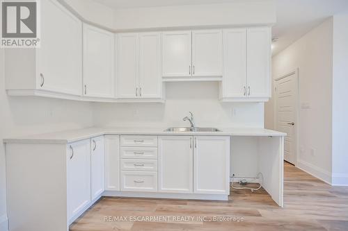 26 - 305 Garner Road W, Hamilton, ON - Indoor Photo Showing Kitchen With Double Sink