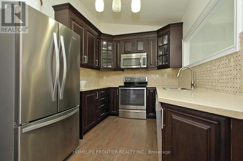 2517 Truscott Drive, Mississauga, ON - Indoor Photo Showing Kitchen With Upgraded Kitchen