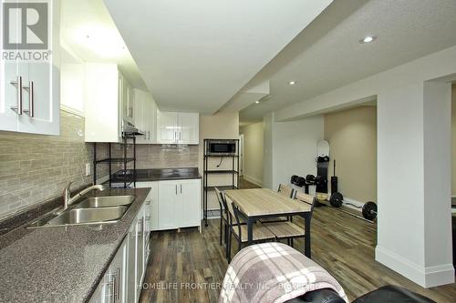 2517 Truscott Drive, Mississauga, ON - Indoor Photo Showing Kitchen With Double Sink