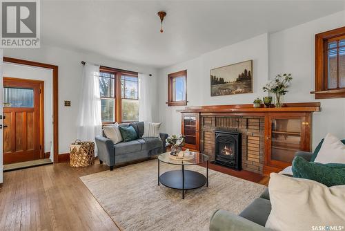 405 9Th Street E, Saskatoon, SK - Indoor Photo Showing Living Room With Fireplace