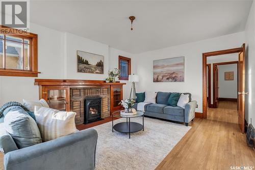 405 9Th Street E, Saskatoon, SK - Indoor Photo Showing Living Room With Fireplace