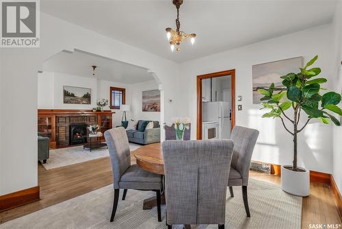 405 9Th Street E, Saskatoon, SK - Indoor Photo Showing Dining Room With Fireplace