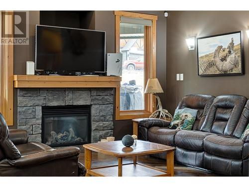 2202 Black Hawk Drive, Sparwood, BC - Indoor Photo Showing Living Room With Fireplace