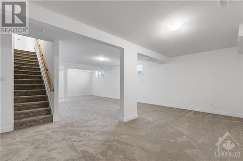 Builder finished basement - 2012 Acoustic Way, Ottawa, ON - Indoor Photo Showing Other Room