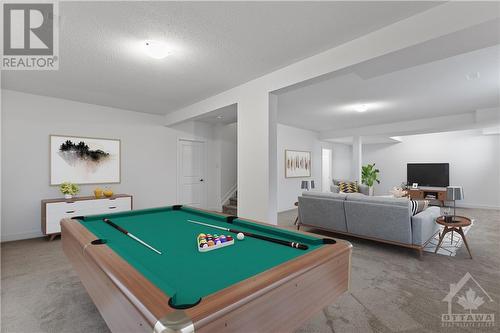 Virtual Staging - Basement recroom - 2012 Acoustic Way, Ottawa, ON - Indoor Photo Showing Other Room