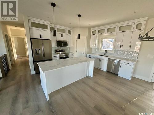 603 Pebble Beach Boulevard, Warman, SK - Indoor Photo Showing Kitchen With Upgraded Kitchen