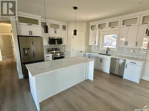 603 Pebble Beach Boulevard, Warman, SK - Indoor Photo Showing Kitchen With Stainless Steel Kitchen With Upgraded Kitchen