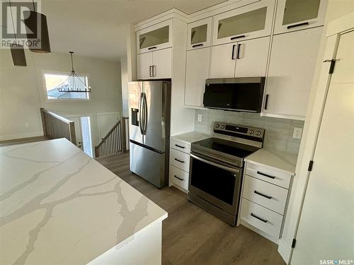 603 Pebble Beach Boulevard, Warman, SK - Indoor Photo Showing Kitchen With Stainless Steel Kitchen