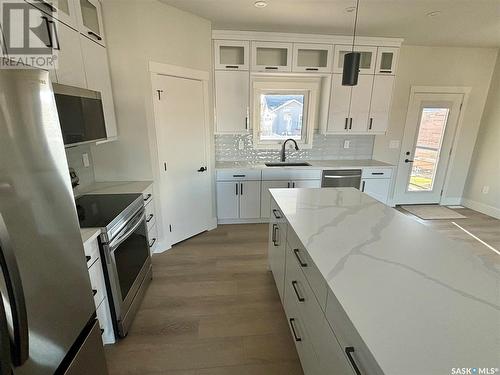 603 Pebble Beach Boulevard, Warman, SK - Indoor Photo Showing Kitchen With Upgraded Kitchen