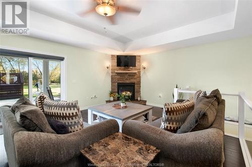 6767 County Rd 50, Amherstburg, ON - Indoor Photo Showing Living Room With Fireplace