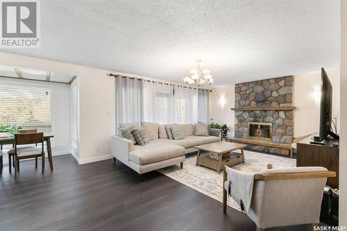 230 Highlands Place, Saskatoon, SK - Indoor Photo Showing Living Room With Fireplace