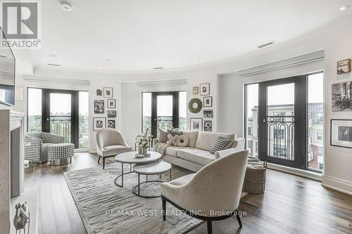 702 - 4 The Kingsway, Toronto, ON - Indoor Photo Showing Living Room With Fireplace