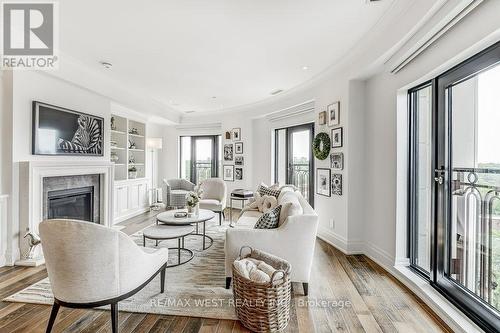 702 - 4 The Kingsway, Toronto, ON - Indoor Photo Showing Living Room With Fireplace