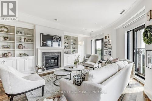 702 - 4 The Kingsway, Toronto, ON - Indoor Photo Showing Living Room With Fireplace