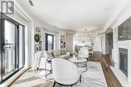 702 - 4 The Kingsway, Toronto, ON - Indoor Photo Showing Living Room With Fireplace