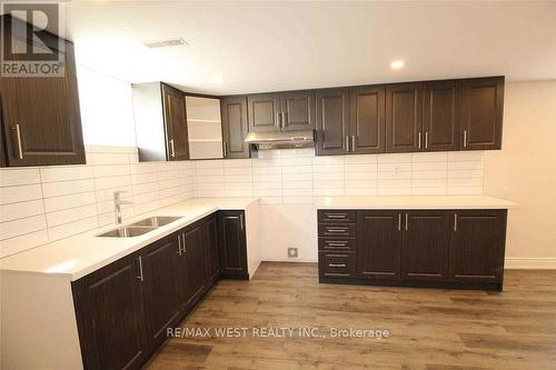 Bsmt - 53 Sutherland Avenue, Brampton, ON - Indoor Photo Showing Kitchen With Double Sink