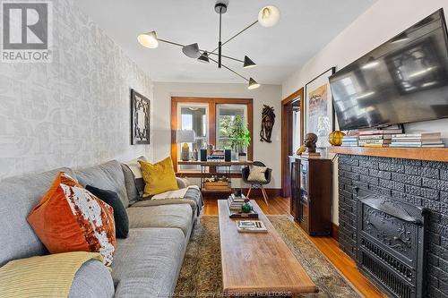 557 Moy, Windsor, ON - Indoor Photo Showing Living Room With Fireplace