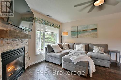 333 Mariners Way, Collingwood, ON - Indoor Photo Showing Living Room With Fireplace