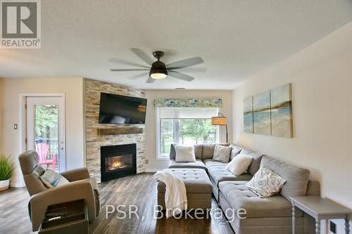 333 Mariners Way, Collingwood, ON - Indoor Photo Showing Living Room With Fireplace