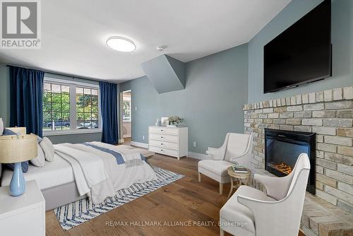 483 Caesar Avenue, Oakville, ON - Indoor Photo Showing Bedroom With Fireplace