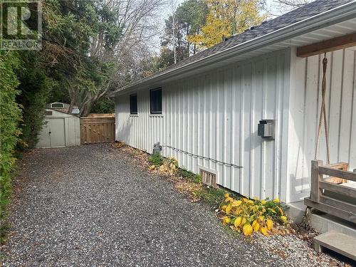 View of side of property featuring a storage shed - 31 Glass Street, Bayfield, ON - Outdoor