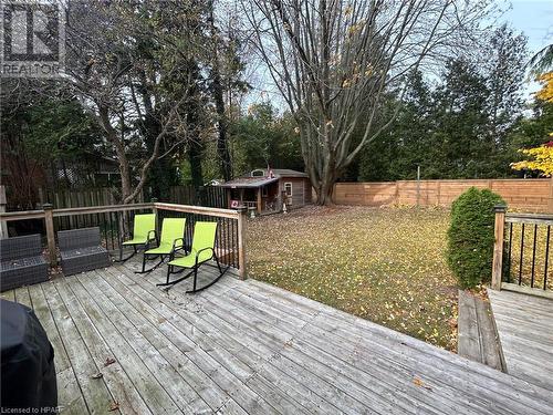 Wooden terrace with a lawn and area for grilling - 31 Glass Street, Bayfield, ON - Outdoor With Deck Patio Veranda