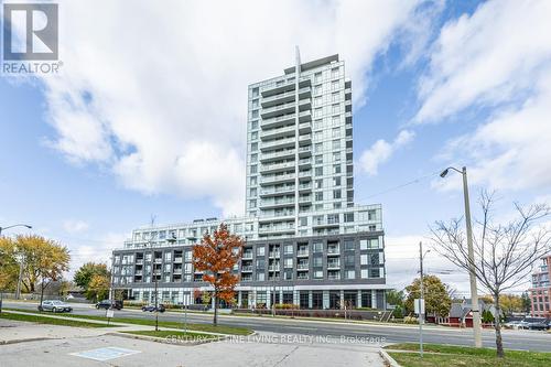 318 - 3220 Sheppard Avenue E, Toronto, ON - Outdoor With Balcony With Facade