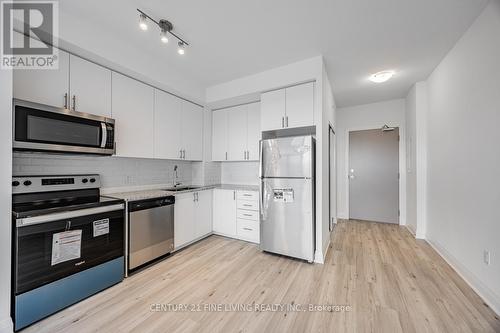 318 - 3220 Sheppard Avenue E, Toronto, ON - Indoor Photo Showing Kitchen With Stainless Steel Kitchen