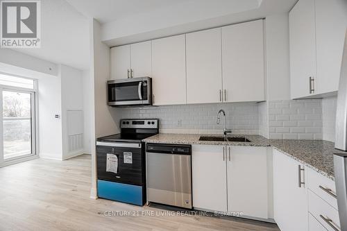 318 - 3220 Sheppard Avenue E, Toronto, ON - Indoor Photo Showing Kitchen With Stainless Steel Kitchen With Upgraded Kitchen