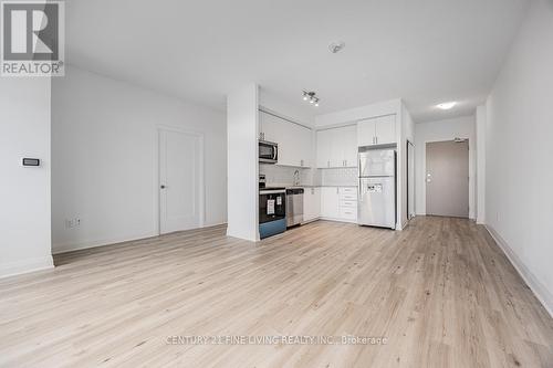 318 - 3220 Sheppard Avenue E, Toronto, ON - Indoor Photo Showing Kitchen