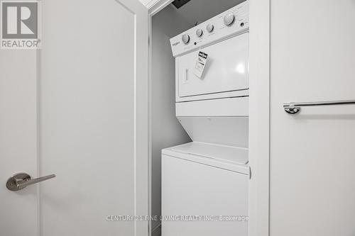 318 - 3220 Sheppard Avenue E, Toronto, ON - Indoor Photo Showing Laundry Room