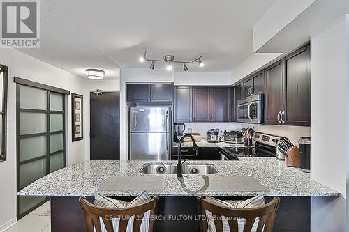 409 - 75 King William Crescent, Richmond Hill, ON - Indoor Photo Showing Kitchen With Double Sink With Upgraded Kitchen