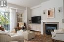 101 - 80 Palace Pier Court, Toronto, ON  - Indoor Photo Showing Living Room With Fireplace 